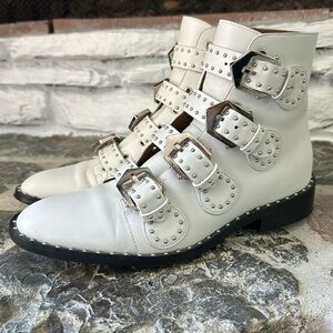 Givenchys iconic White Buckle Boot. Barely worn. Great condition.